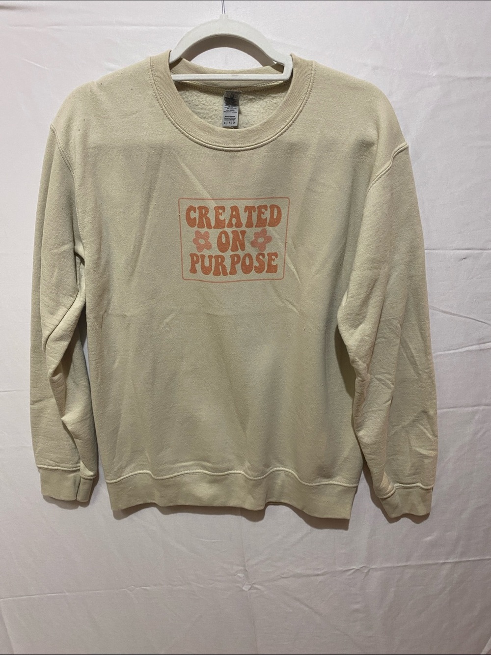Gildan Cream Crewneck Sweatshirt with Orange 'Created On Purpose' Graphic